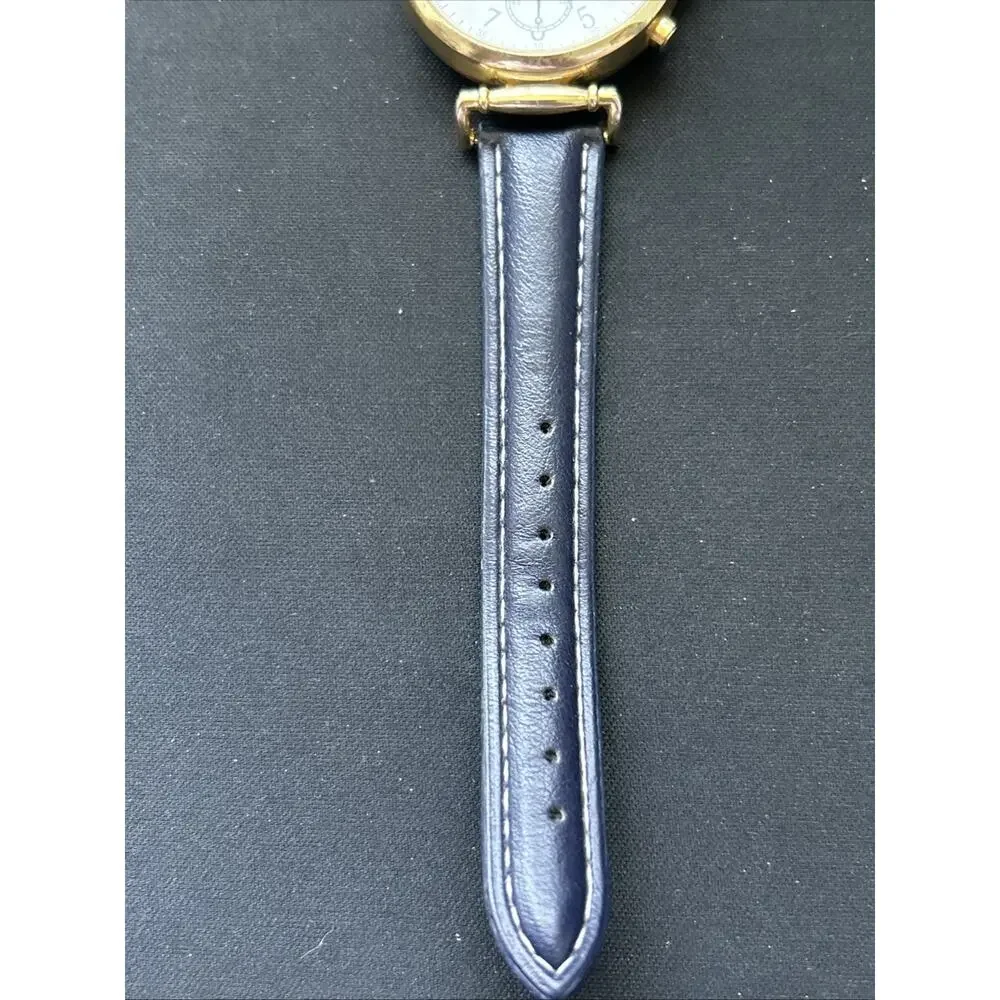 Charming Charlie Gold Tone Navy Blue Band Women’s Quartz Watch